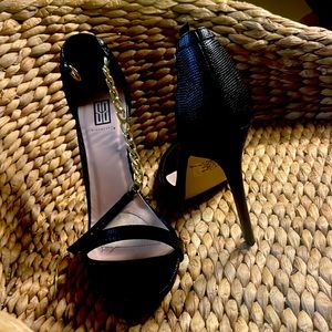 Gold chain black heels